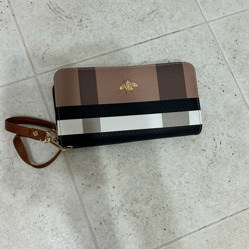 Elegant Striped Wallet with Gold Bee Emblem